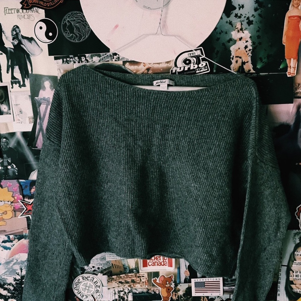 subdued grey sweater